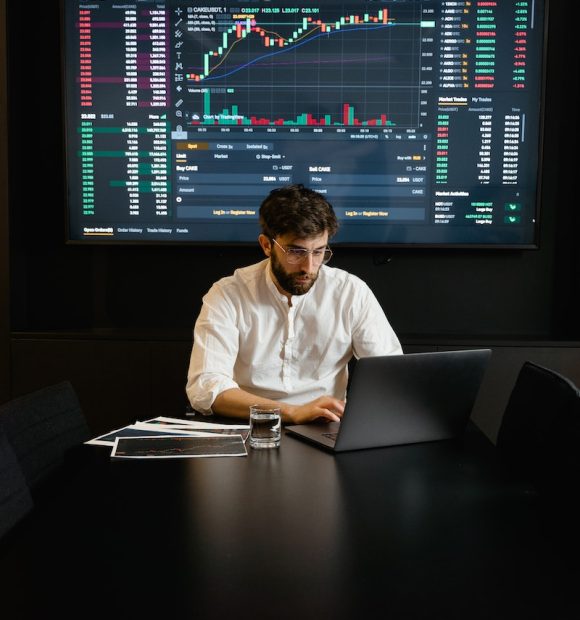 Focused Professional Man using Laptop